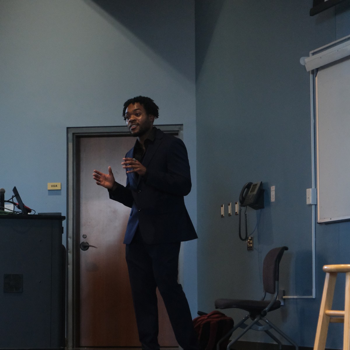 Vanwayne Chaney Jr. speaking on stage at Miami University