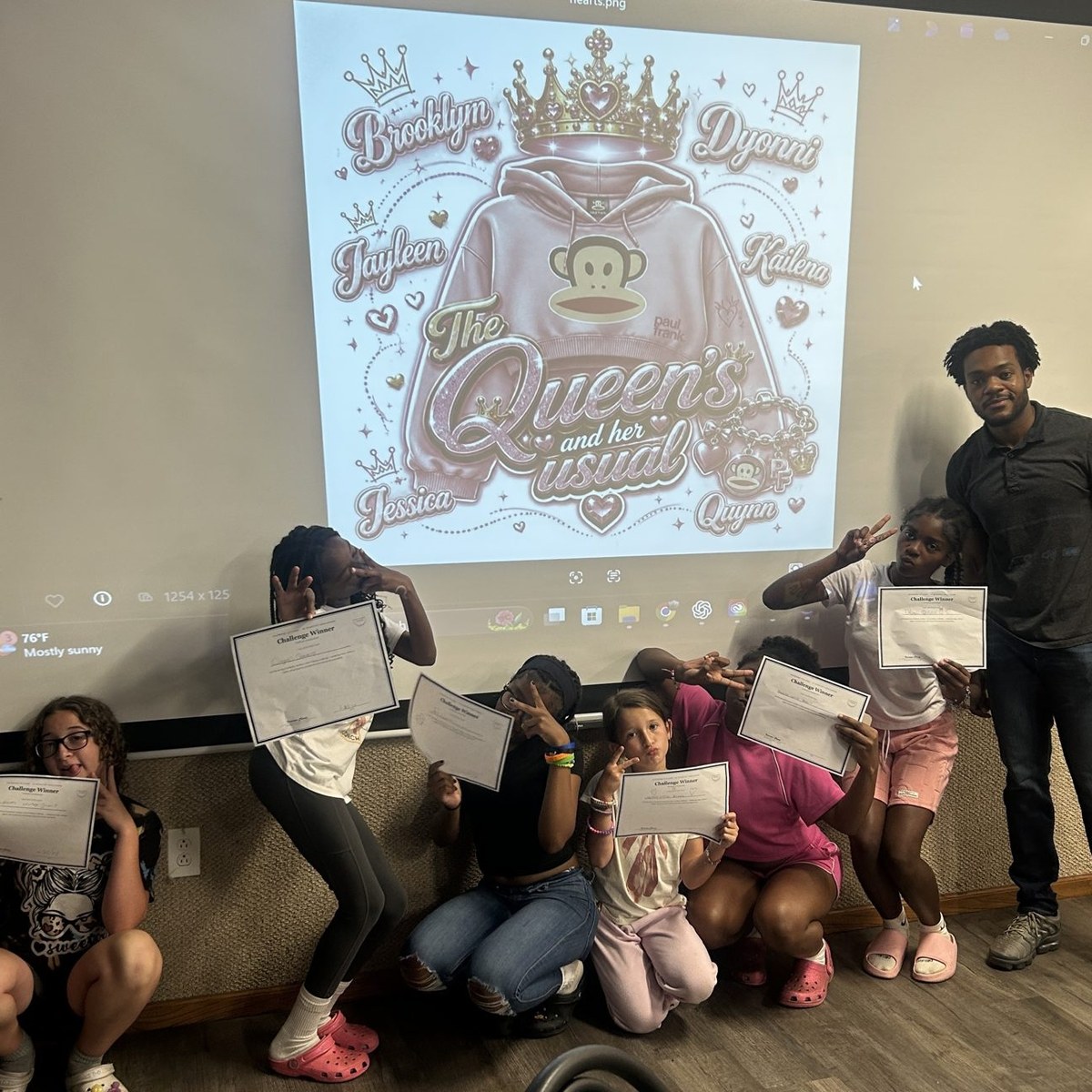 Vanwayne Chaney Jr. with summer program students holding their AI challenge certificates
